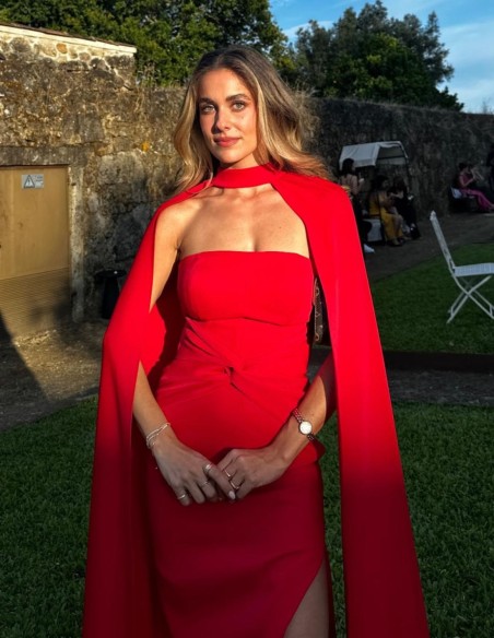 Long party dress with ruching and cape for guests