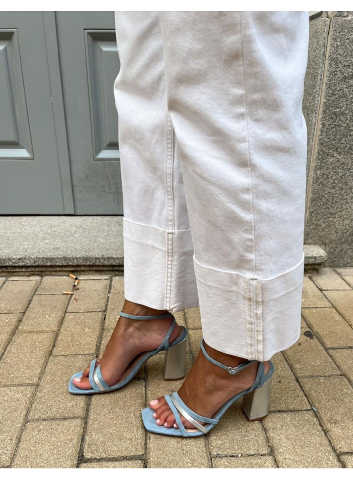 Blue party sandal with straps tied at the ankle