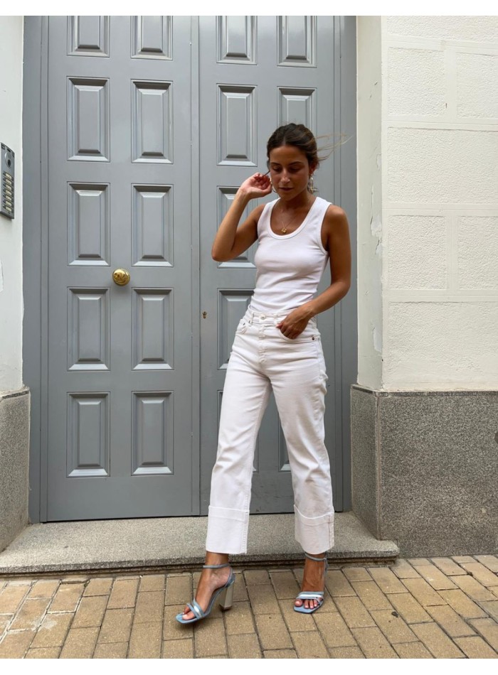 Blue party sandal with straps tied at the ankle