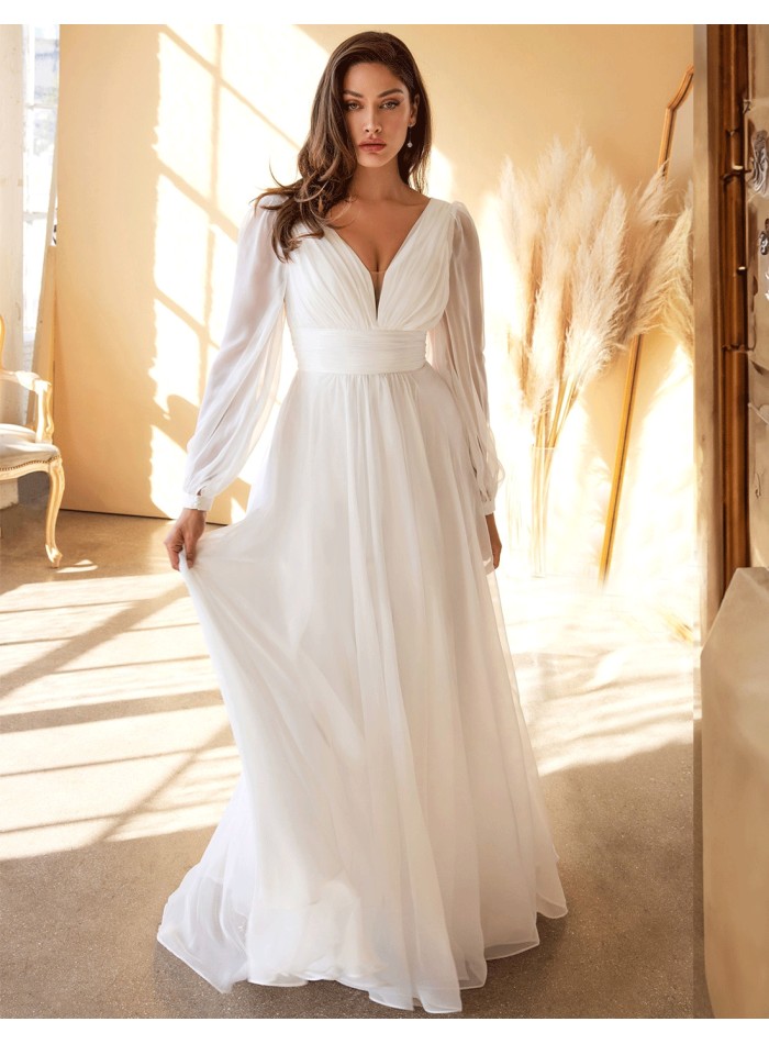 Robe de mariée en mousseline à manches longues...