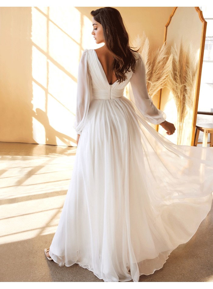 Robe de mariée en mousseline à manches longues...