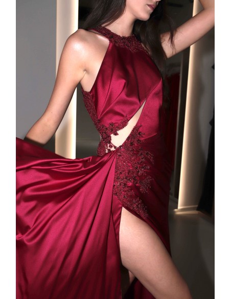 Long burgundy satin dress with slit, halter neckline and rhinestones