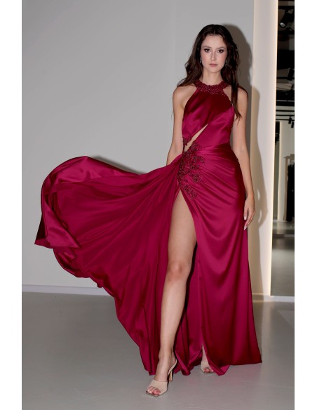 Long burgundy satin dress with slit, halter neckline and rhinestones