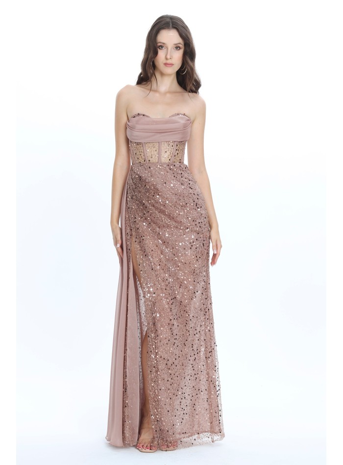 Long strapless maxi dress with strapless neckline and shiny fabric.