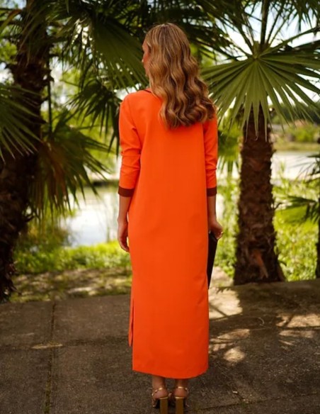 Orange kaftan style guest dress with black detailing