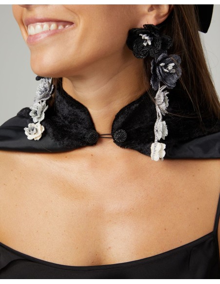 Short black velvet coat with button closure