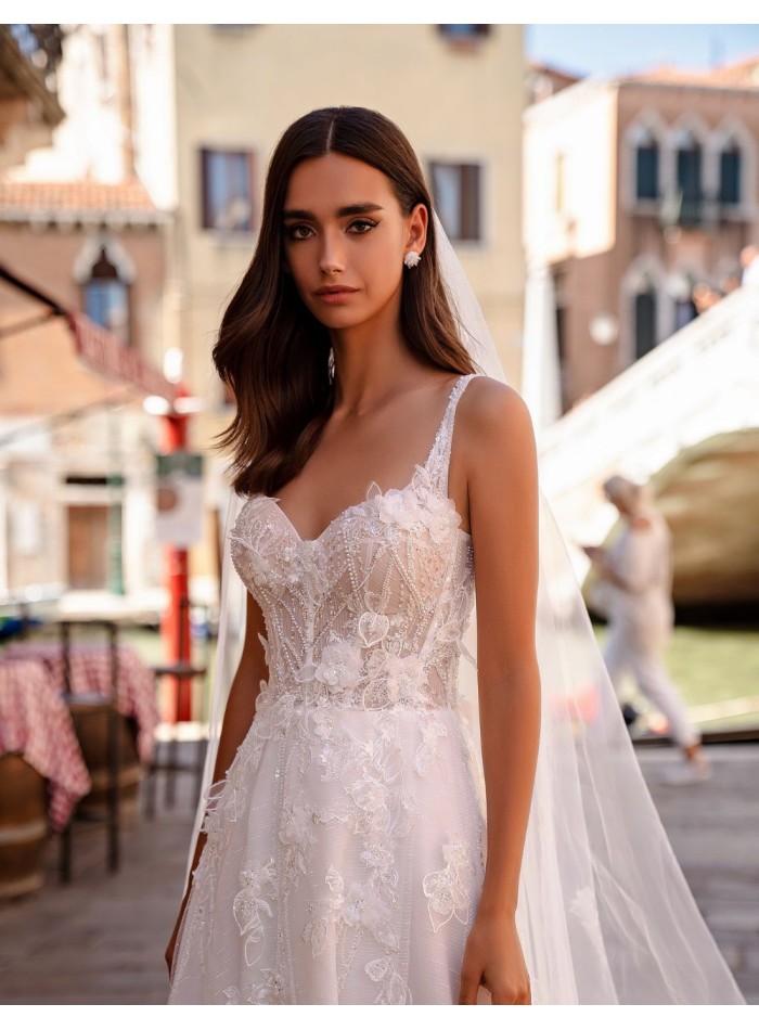 Ivory wedding dress with straps and floral embroidered lace bodice