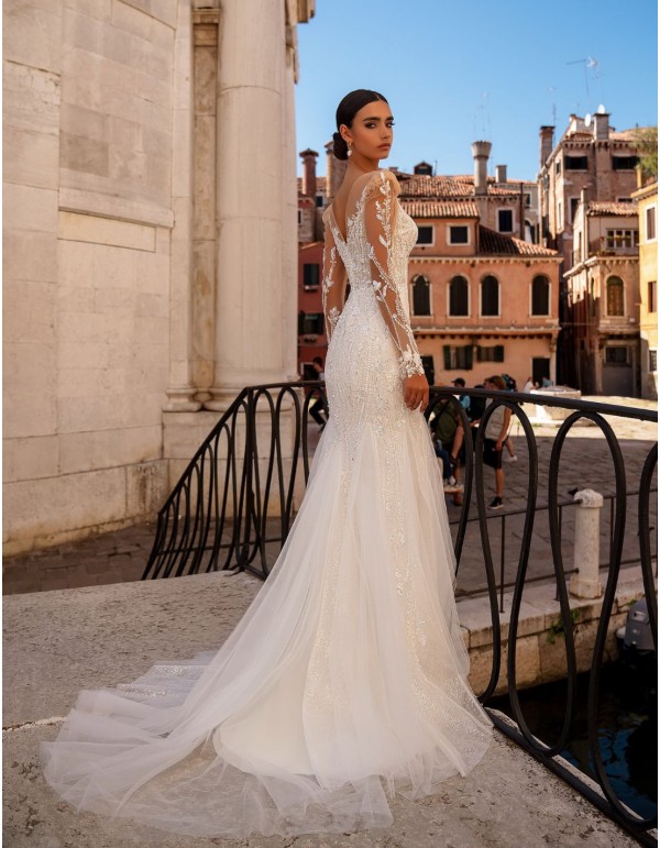 Long wedding dress with long sleeves and lace tattoo effect