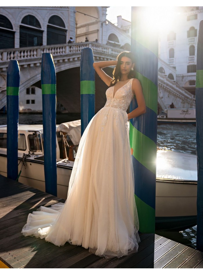 Ivory long wedding dress with V-neckline and...