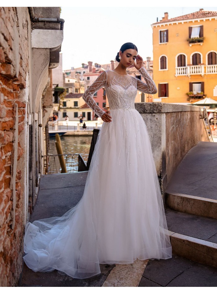 Long princess cut wedding dress with long...