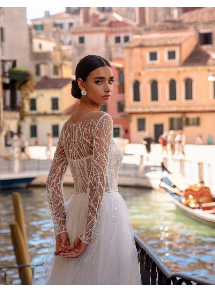 Long princess cut wedding dress with beaded...