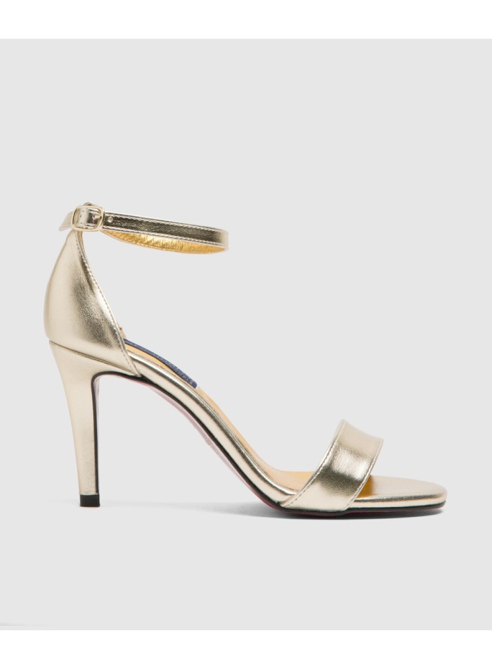 Gold leather party sandal with ankle strap fastening