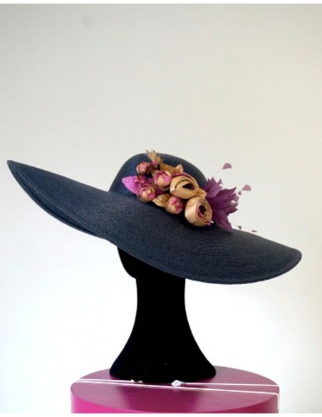 Wide winged hat with hydrangeas and feathers by Lamatte
