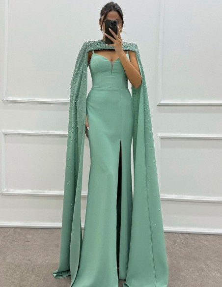 Maxi party dress with cape sleeves and rhinestone details