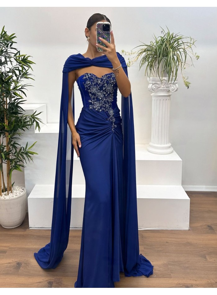 Evening dress with rhinestone neckline, draped detail and cape