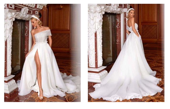 Vestido de novia con escote asimétrico y abertura lateral