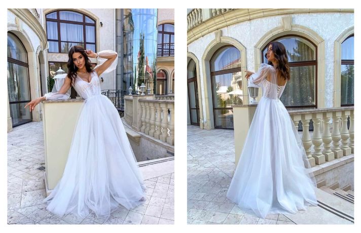 Vestido largo de novia con capas de tul y manga larga de gasa abierta